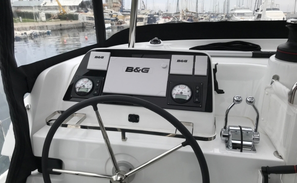 lagoon-42-steering 4_lagoon-42-steering Family Sailing Holidays in the Mediterranean areas of Greece, Italy, Spain and France. - Lagoon 42 - Sunrise | Family Sailing Catamaran Charter